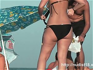 bare beach voyeur vid of super-hot playful nudists in water